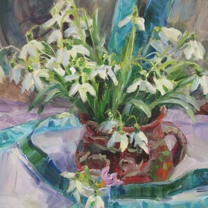 May include: An oil painting of a bouquet of white snowdrop flowers in a brown ceramic pitcher. The flowers have green stems and leaves. A turquoise ribbon and white cloth are in the background.