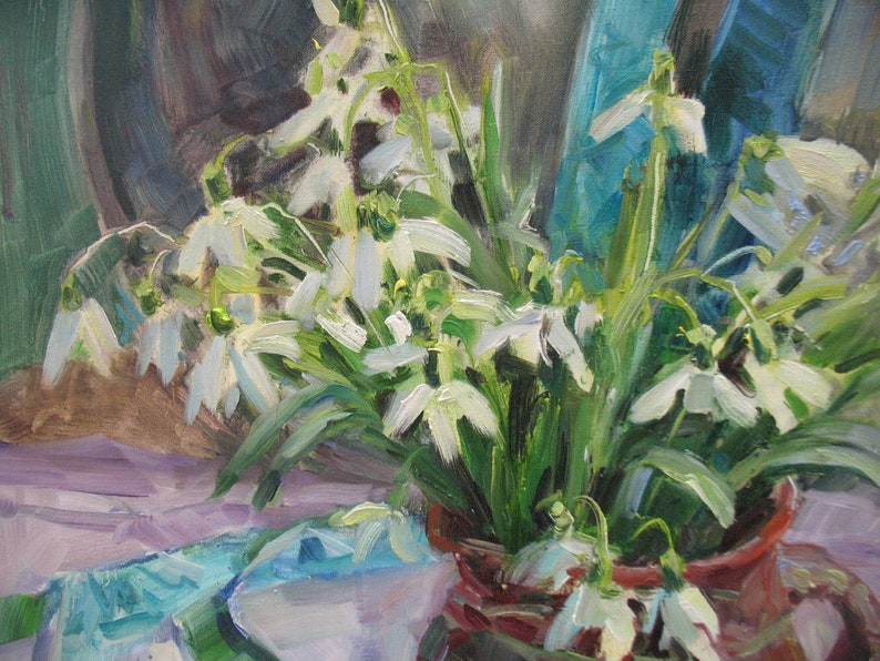 May include: Oil painting of a bouquet of white snowdrop flowers in a terracotta pot. The flowers have delicate white petals and green stems and leaves. The background features soft blues and greens.