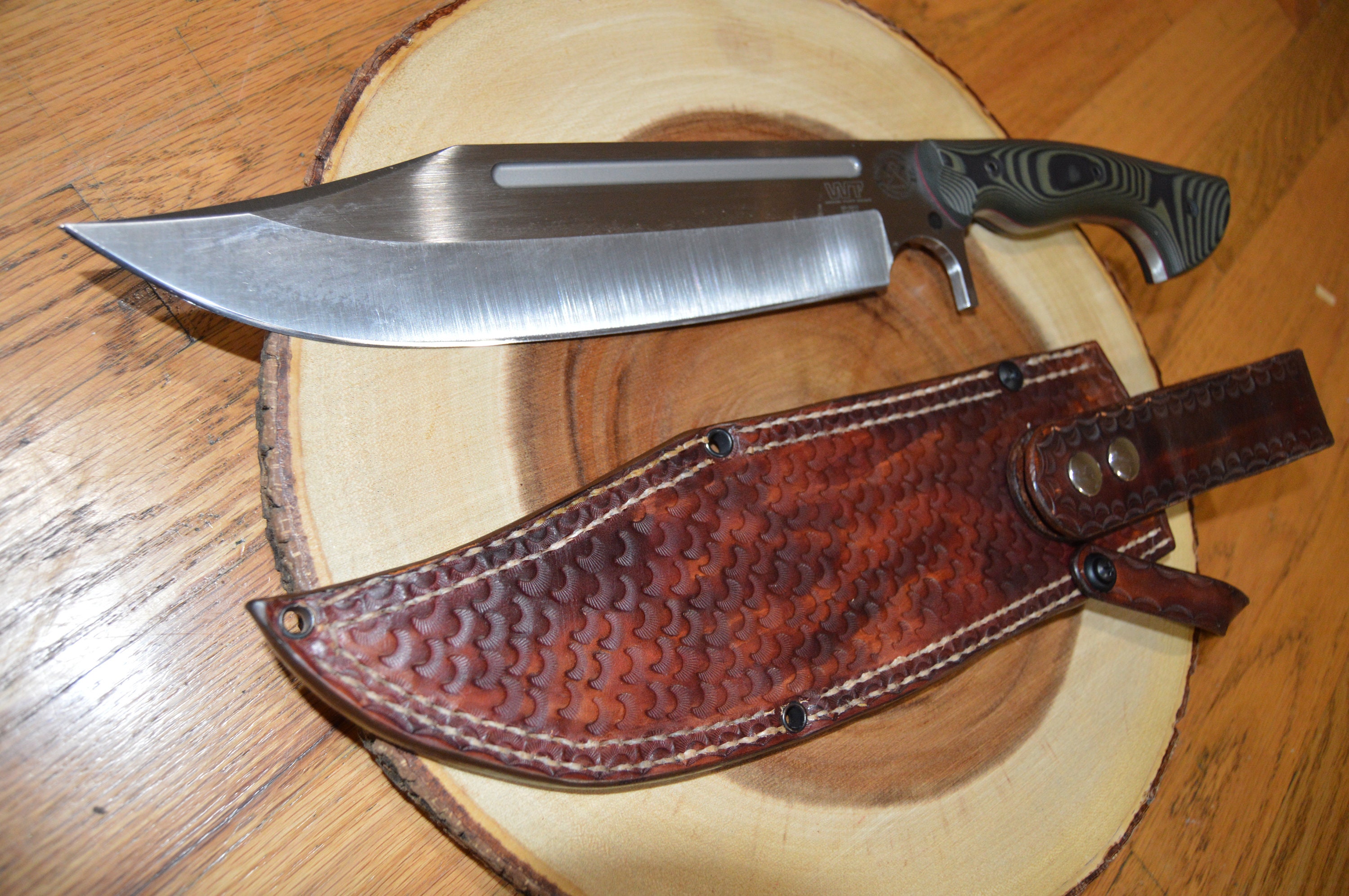 14.5” long custom handmade leather sheath fits up to 8—9 cutting blade  Bowie knife