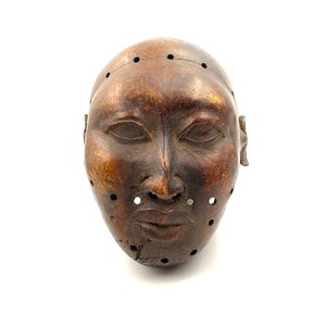 African Trophy head of a foreign ruler, bronze, Benin Kingdom, early XX century