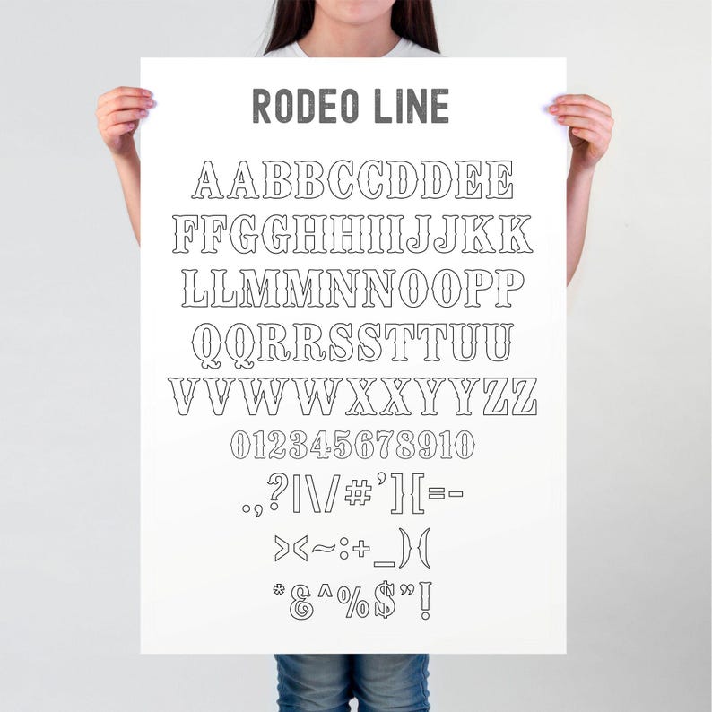 May include: A white poster with the text "RODEO LINE" in gray at the top. The poster features a black and white outline font with uppercase letters, numbers, and symbols.