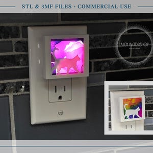 Peut inclure: Veilleuse blanche avec un motif de silhouette de chat. La veilleuse est branchée dans une prise murale et possède un fond abstrait coloré. L'image comprend également le texte "STL & 3MF FILES + COMMERCIAL USE".