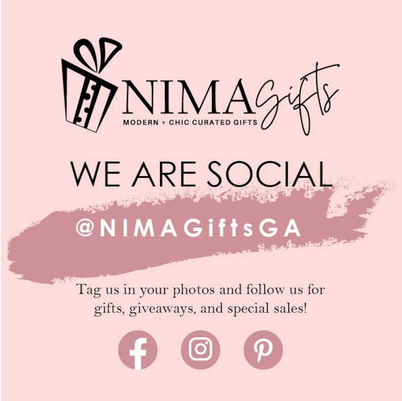 May include: A pink and white graphic with the text "NIMAGifts" in black, followed by "MODERN + CHIC CURATED GIFTS" in smaller black text. The graphic also includes a black and white illustration of a gift box with a bow. The text "WE ARE SOCIAL" is in black and the text "@NIMAGifts GA" is in black. The graphic also includes social media icons for Facebook, Instagram, and Pinterest.
