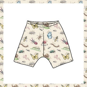 May include: Cream-colored shorts with a repeating pattern of various insects, including butterflies, beetles, and spiders. The insects are in shades of brown, green, and blue. The shorts have a black outline.