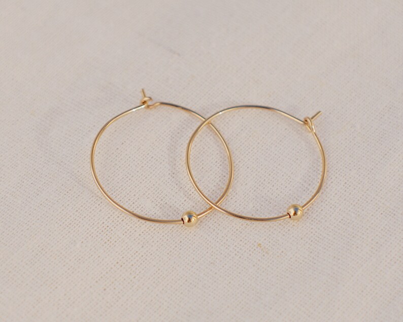 gold hoops with diamond balls