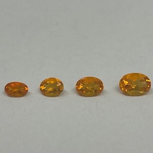 Mexican Opal Oval Faceted Calibrated Loose Gemstones AAA Loupe Clean Reddish Orange Color