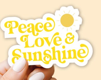 May include: Yellow sticker with the text "Peace Love & Sunshine" in a retro font. A yellow sun graphic is above the text.