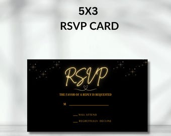 May include: Black RSVP card with gold glitter and a gold neon RSVP sign. The text "THE FAVOR OF A REPLY IS REQUESTED" is below the sign. There are lines for the guest to fill in their name and indicate whether they will attend or regretfully decline.