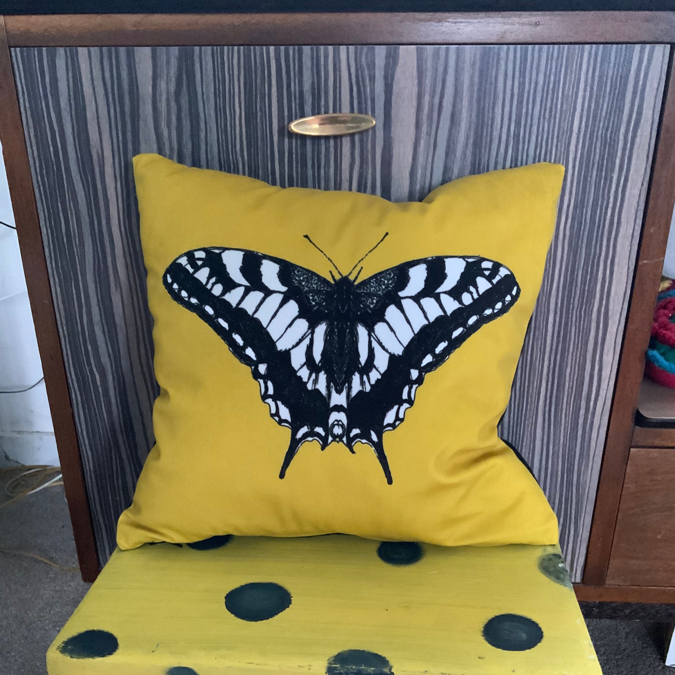 Grey top butterfly cushions