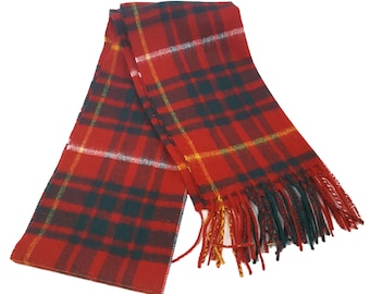 May include: Red, black, white, and yellow plaid scarf with fringed ends.