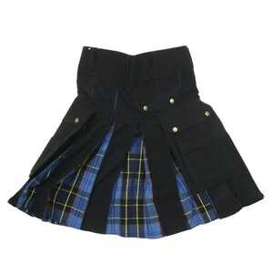May include: A black utility kilt with a blue and yellow tartan lining. The kilt has multiple pockets and a buckle closure.