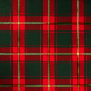 May include: A red and green plaid fabric with a subtle yellow stripe. The fabric has a woven texture.