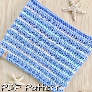May include: A blue and white striped crochet cowl with a textured stitch pattern. The cowl is made with a soft yarn and has a delicate, feminine look.  PDF Pattern.