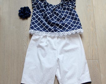Girls' Navy Quatrefoil Peasant Top & Capri Set with Flower Clip