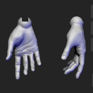 以下が含まれることがあります： 中立のポーズをとった人間の3Dモデル。モデルは薄いグレーでレンダリングされ、2つの異なる角度から表示されています。モデルはSTLファイルとしてデジタルダウンロードできます。モデルはZbrush 2023で作成されました。