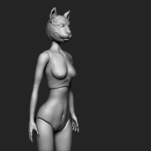May include: A grey, sculpted figure of a woman with a cat head. The figure is wearing a simple, strapless top and a skirt.