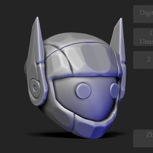 May include: A 3D printed model of a robot head with a gray finish. The head has two large ears and a visor. The model is designed for 3D printing and comes with two STL files. The model was created in Zbrush 2023.
