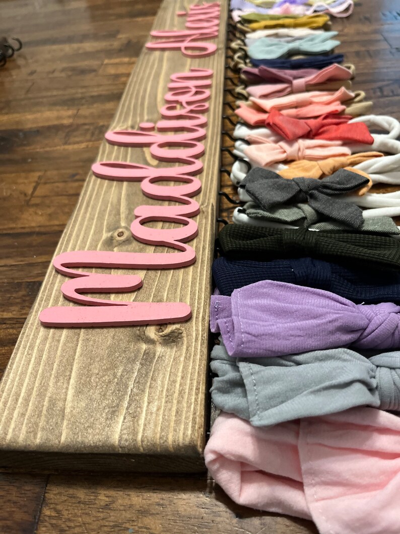 24"with special walnut stain, pink letters, font B