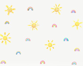 May include: A white wall with colorful rainbow and yellow sun decals. The decals are arranged in a random pattern.