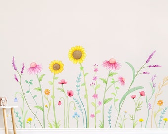 May include: A watercolor wall decal featuring a row of colorful flowers, including sunflowers, daisies, and lavender. The decal is perfect for adding a touch of nature to any room.