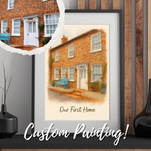 May include: Framed watercolor painting of a brick house with a white door and windows. The painting includes a blue bench and the text "Our First Home." Below the painting is the text "Custom Painting!"
