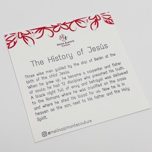 May include: A white card with black text describing the history of Jesus. The card has a red floral border and the text "The History of Jes&uacute;s" at the top. The text includes the words "Three wise men", "carpenter", "fisher", "disciples", "betrayal", "crucified", "heaven", "Holy Spirit", and "@melinaalmontecouture".