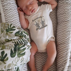 Somebody's Problem Baby Bodysuit - Super Soft Organic Cotton, Perfect Gift for new borns or 1st Birthdays...