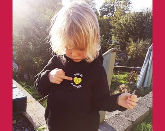 Son of A Raver!! also printed on the back, 100% Organic Cotton Warm Snuggly Hoodie..