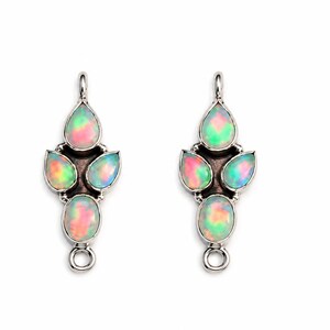May include: A pair of silver-toned metal jewelry connectors, each featuring four iridescent, multi-colored opal-like stones arranged in a vertical cluster. Each piece includes a small circular loop at the top and bottom for attachment to other jewelry components.