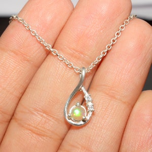 Natural Ethiopian Opal Pendant Necklace: Sterling Silver, Fire Opal
