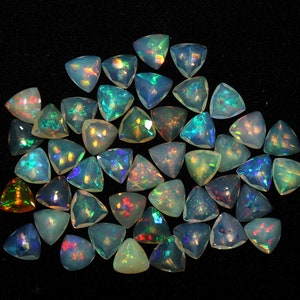 Faceted Ethiopian Fire Opal: Trillion Cut Crystal Cabochon