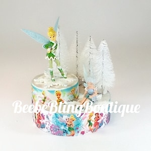 Disney Tinkerbell and sister Periwinkle cake topper.  Disney Fairies centerpiece decoration.  A great keepsake for your memories.