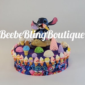 Disney Stitch cake topper.  Stitch centerpiece decoration.  A great keep sake for your memories.