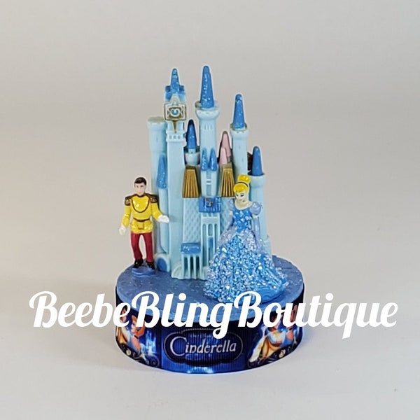 Disney Cinderella Castle cake topper.  Cinderella with Prince Charming & Castle centerpiece decoration.  Great keepsake for your memories.