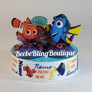 Disney finding Nemo cake topper. Find finding Dory centerpiece decoration. A great keepsake for your memories.