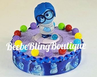 Disney Sadness cake topper.  Inside Out centerpiece decoration.   A great keepsake for your memories.  Piece unique.