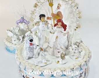 Disney The Little Mermaid wedding cake topper. Little Mermaid and Ursula wedding Centerpieces Decoration. Great keep sakes. Pieces unique.