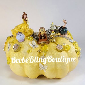 Disney Beauty and the Beast pumpkin.  Belle, Lumiere, Cogsworth, Mrs. Potts, and Duster pumpkin centerpiece.  A great Keepsake.