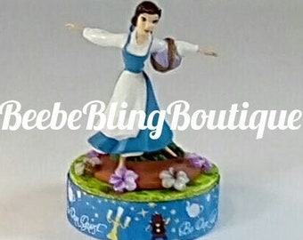 Disney Belle cake topper.  Disney Beauty and the Beast centerpiece.