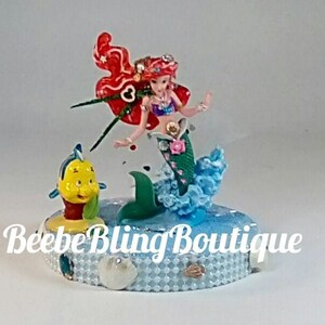 Disney Little Mermaid cake topper, Ariel is the Princess of the sea and Flounder the fish centerpiece.