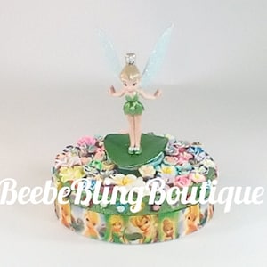 Disney Tinkerbell cake topper.  Fairy centerpiece decoration.  A great keepsake for your memories.