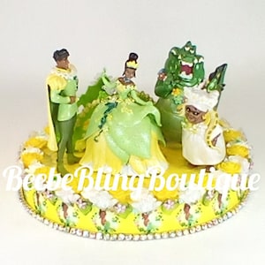 Disney Princess and the Frog cake topper.  Princess Tiana and Prince Naveen wedding centerpiece decoration.  A Keepsake for your memories.
