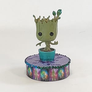 Disney baby Groot cake topper.  Guardians of the Galaxy centerpiece decoration.  A great keepsake for your memories.
