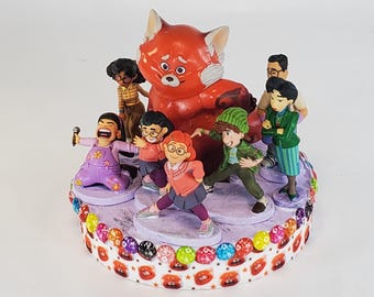 Disney Turning Red cake topper.  Turning Red centerpiece decoration.  A great keepsake for your memories.  Not fondant!