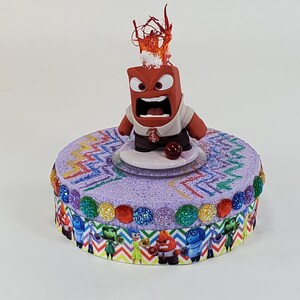 Disney Anger cake topper.  Inside Out centerpiece decoration.  A great keepsake for your memories.  Not fondant!