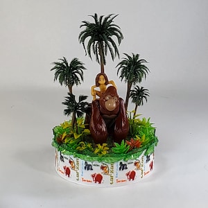 Disney Tarzan cake topper.  Tarzan centerpiece decoration.  A great keepsake for your memories.  Not fondant!