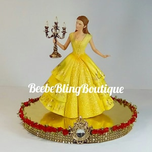 Disney Belle centerpiece.  Belle with Lumiere in the new Beauty and the Beast movie figures.