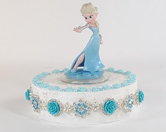 Disney Elsa cake topper.  Frozen centerpiece decoration.  A great keepsake for your memories.  Not fondant!
