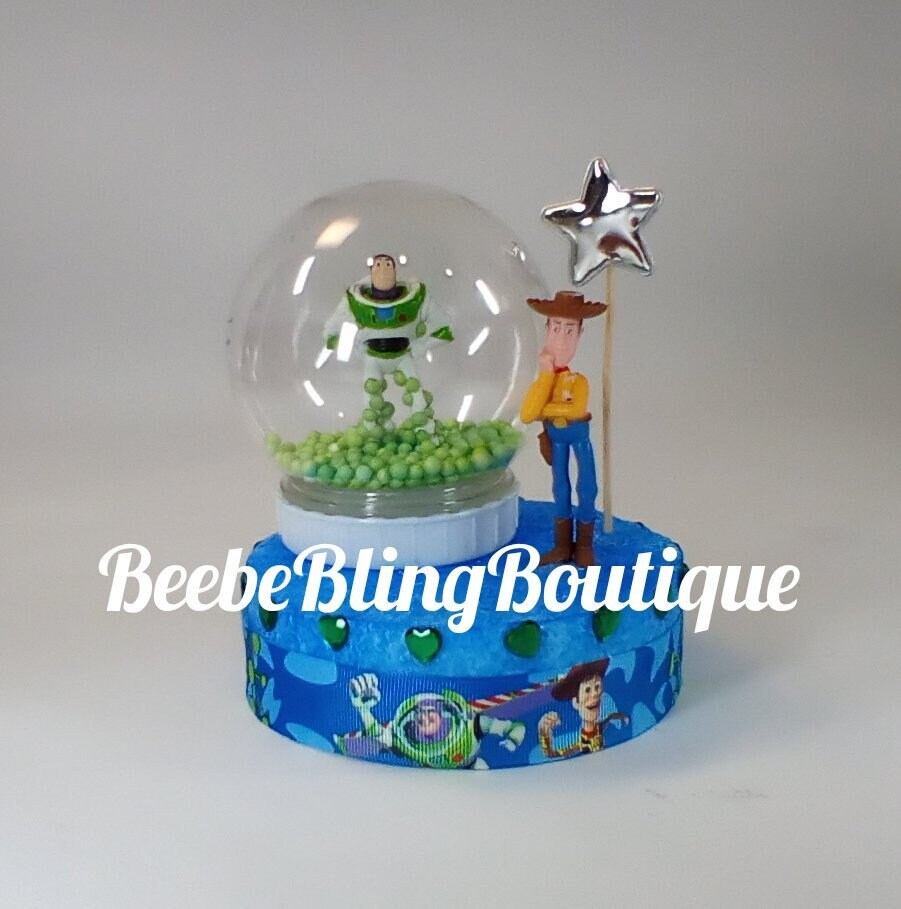 Disney Toy Story plastic globe cake topper Sheriff Woody and Buzz Lightyear centerpiece