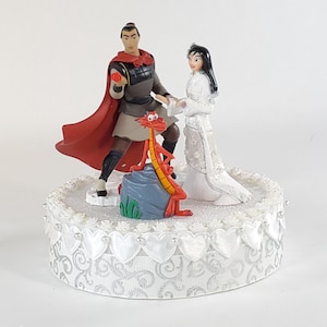 Disney Princess Mulan wedding cake topper.  Captain Shang and Mulan centerpiece decoration.  A great keepsake for your memories.